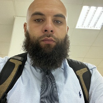 Ayman B.